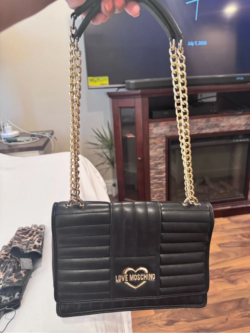 Love Moschino Black Quilted Messenger Bag with Gold Logo
